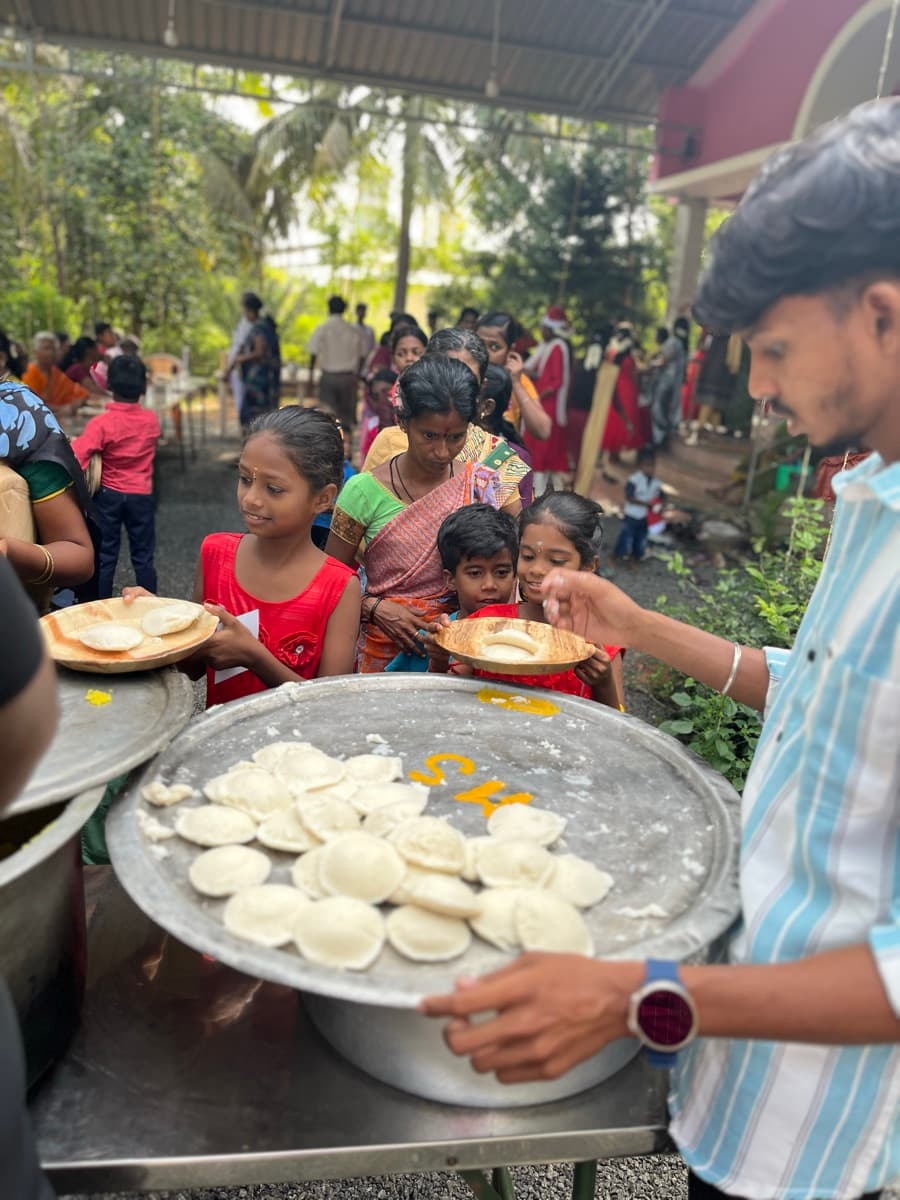 Serving food to children and families at a community event
