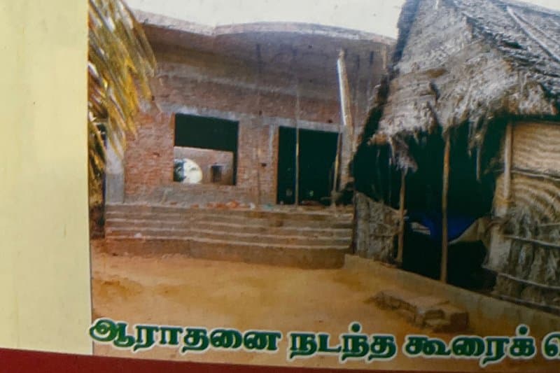 The thatched shed where early worship services were held